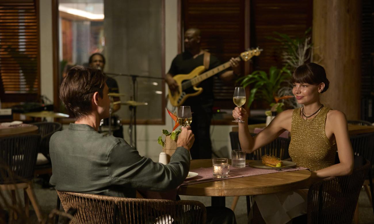 couple enjoying dinner in laroul restaurant